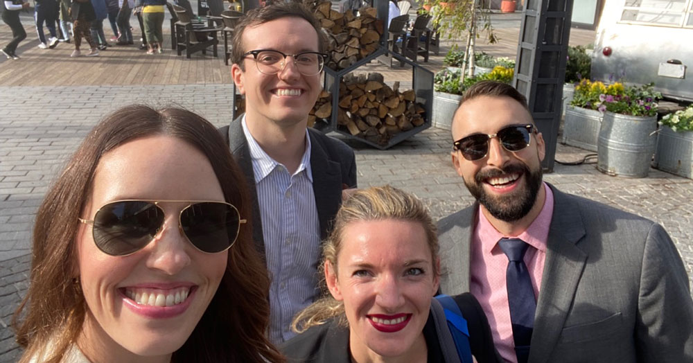 Photo of CDT's Civic Tech team members – left to right, Elizabeth Laird in sunglasses, Aaron Spitler in glasses, Hannah Quay-de la Vallee, and Cody Venzke in sunglasses.