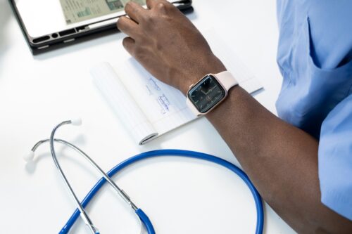 Doctor wearing aooke watch.