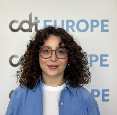 Rand Hammoud in front of CDT Europe banner