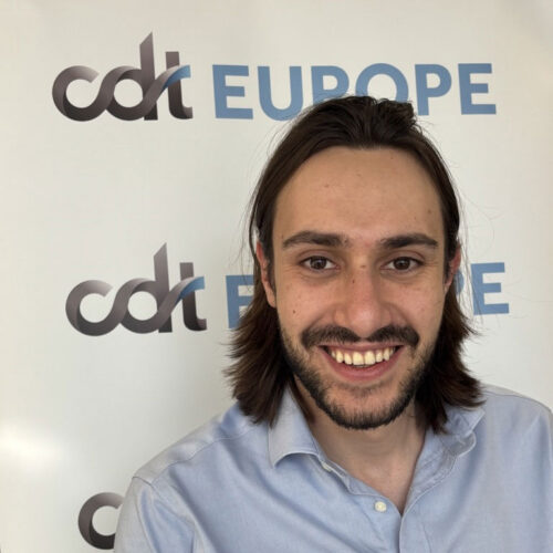 Marcel Mir in front of CDT Europe's banner