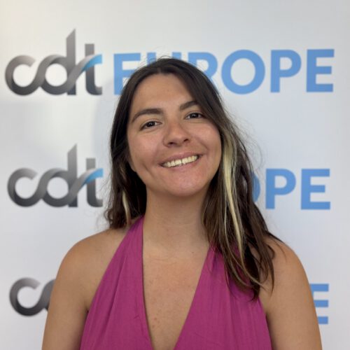 Aimée Duprat-Macabies standing in front of CDT Europe logo banner