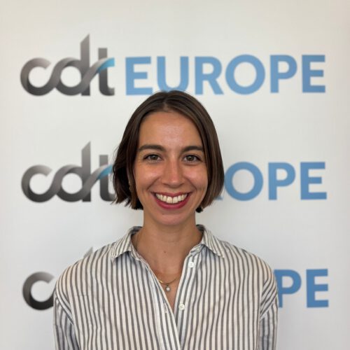 Sarah Graham in front of CDT Europe's logo banner