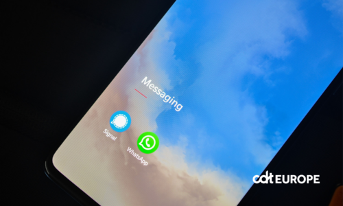 Close-up of smartphone screen showing Signal and WhatsApp messaging apps